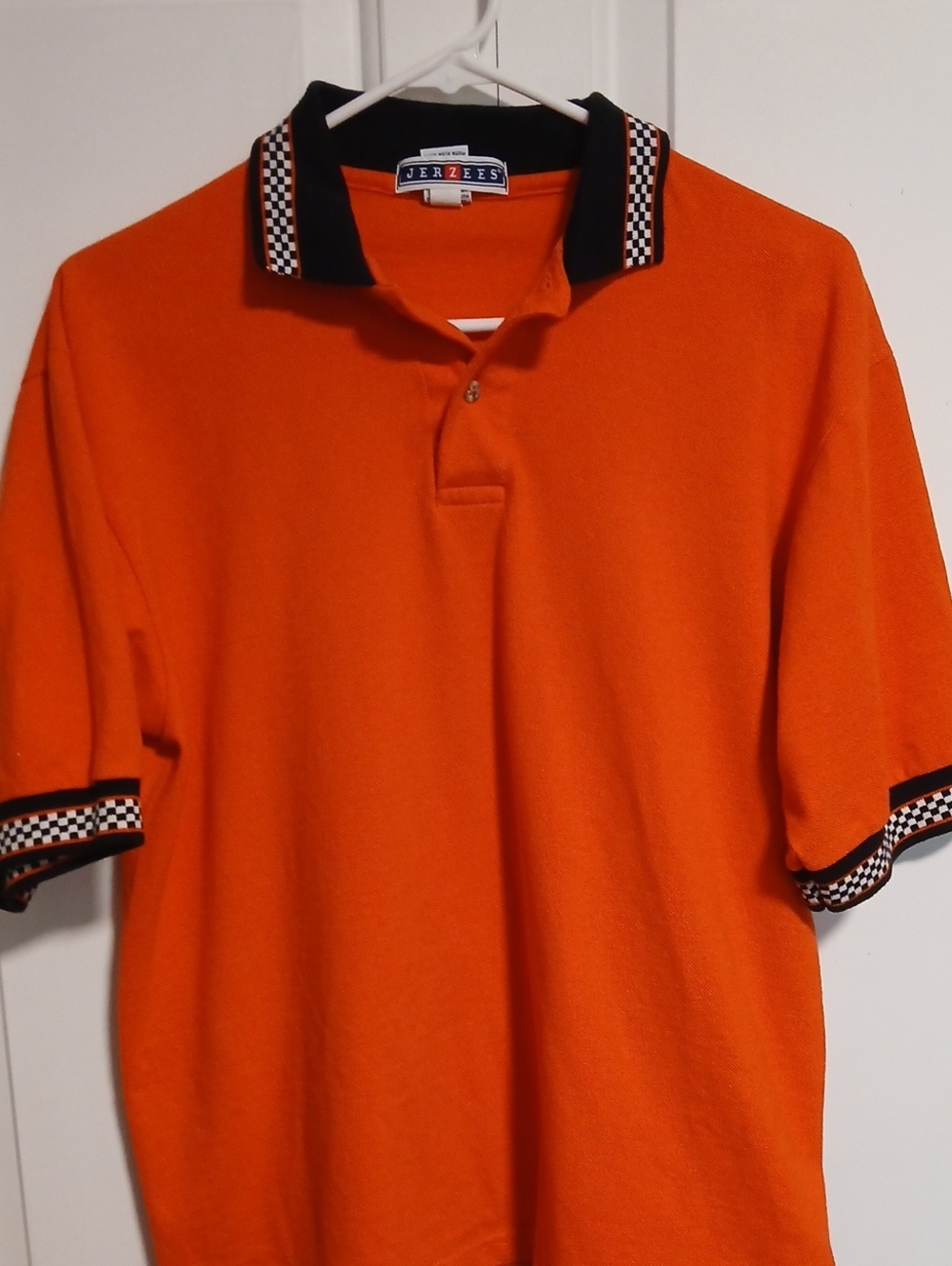 Jerzees Orange Polo with Black Checkerboard Trim